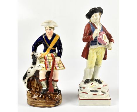 An early 19th century pearlware figure of a hurdy-gurdy player, c1820, on square base, height 22.5cm, with a mid 19th century