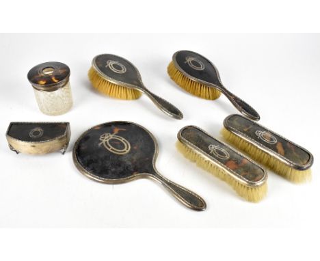 LEVI &amp; SALAMAN; a George V silver mounted tortoiseshell seven piece dressing table set, Birmingham 1919, including a smal