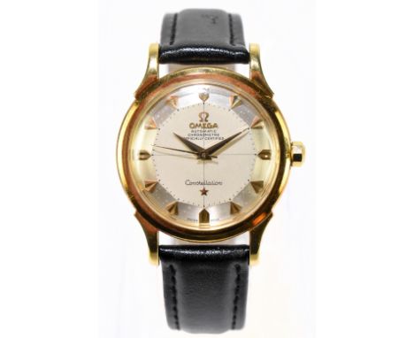 OMEGA; a mid 1950s gentleman's 18ct yellow gold constellation automatic wristwatch, the stepped circular dial set with angled