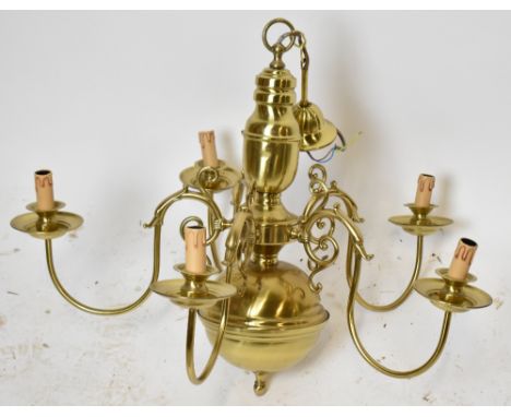 A reproduction brass Dutch style five branch chandelier.&nbsp;