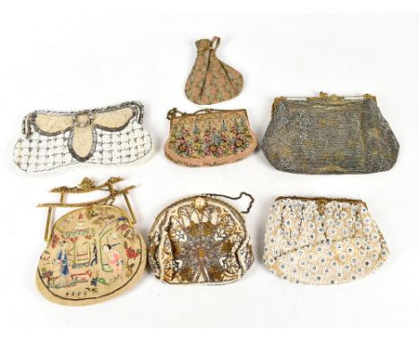 A collection of seven vintage gold and silver evening bags including four beaded metal framed bags with top closure, two embr