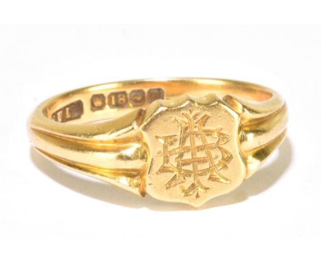 An 18ct yellow gold signet ring engraved with the initials 'AB' to the shield shaped platform, size Q, approx 5.75g.Additiona