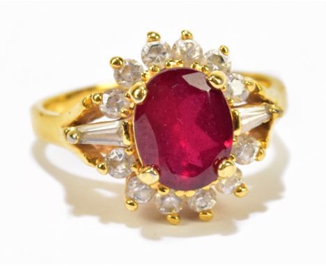 A yellow metal dress ring with simulated ruby, size N, approx 3.4g.