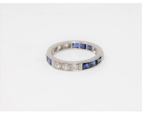 A fine antique platinum sapphire and diamond set full eternity ring, size N1/2