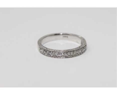 A heavy 18ct gold diamond half-eternity ring, approximately 0.6 carat, size Q1/2