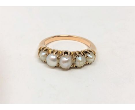 An 18ct gold pearl ring