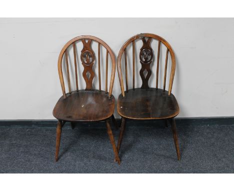 A pair of Ercol dining chairs 