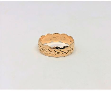 A 9ct gold band ring, size R1/2 CONDITION REPORT: 3.7g.