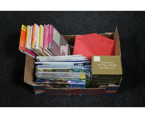 A box of Beatrix Potter VHS box set, Wills and Senior cigarette cards, ordnance survey maps, envelope of stamps 