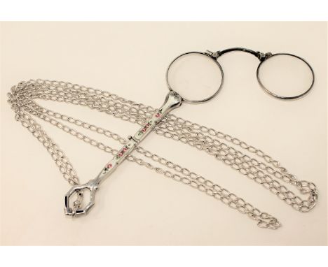 An antique silver and enamelled lorgnette upon a long silver guard chain, length approx. 150cm