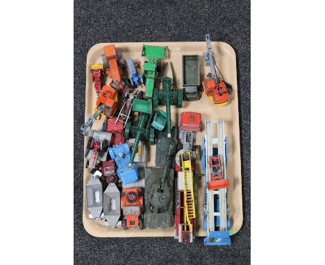 A tray containing mid 20th century and later die cast vehicles including farming equipment, tanks, cranes, transporters, Dink