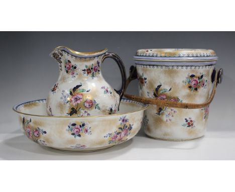 A Keeling &amp; Co Losol Ware part wash set, decorated with sprays of flowers against a speckled gold ground, comprising jug 