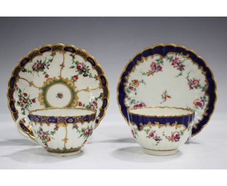 A Worcester reeded French shape teacup and saucer, circa 1780, painted with floral swags divided by gilt scrolls around a cen