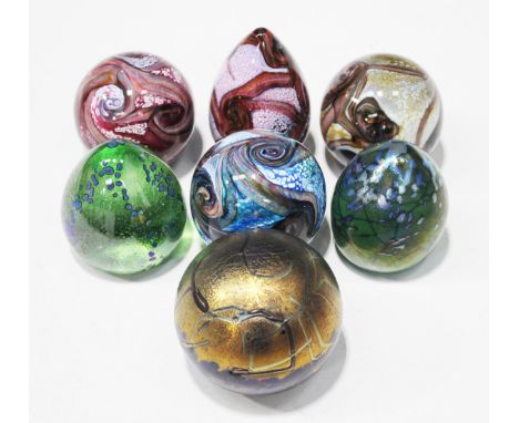 Three Isle of Wight glass spherical gemstone paperweights in amethyst, aquamarine and topaz, a conical amethyst example, two 