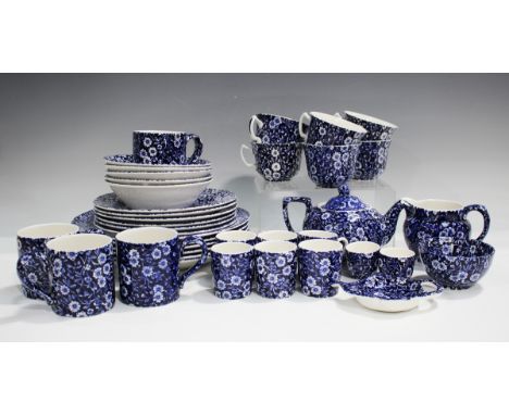 A Burleigh Calico pattern part service, including a Biscuit jar and cover, Tea, Coffee and Sugar jars and covers, dinner and 