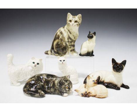 Two Winstanley pottery cats and five Beswick cats.Buyer’s Premium 29.4% (including VAT @ 20%) of the hammer price. Lots purch