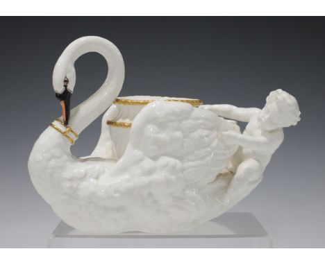 A Royal Worcester planter, circa 1875, modelled as a putto riding the tail feathers of a swan which is supporting a pot betwe