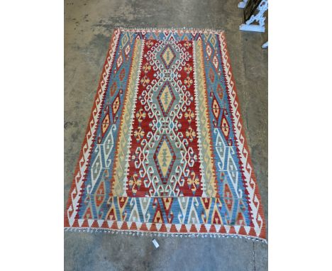 A Kelim flat weave carpet, 140 x 210cm