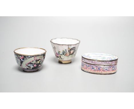 Two 18th century Chinese Canton enamel cups, and a 19th century Canton enamel oval snuff box, 5.8cm