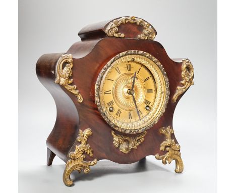 A late 19th century American brass mounted mahogany mantel clock, height 27cm