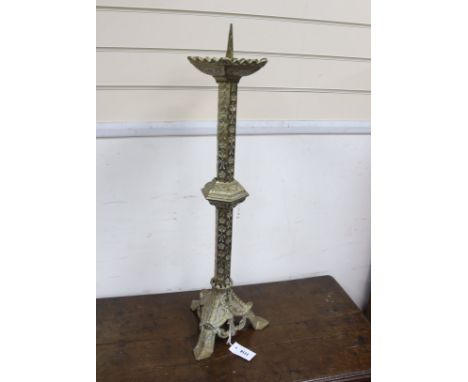 A brass eclisiastical candlestick, height 82cm
