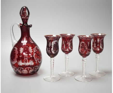 A Bohemian wheel engraved ruby flashed glass decanter and four matching liqueur glasses