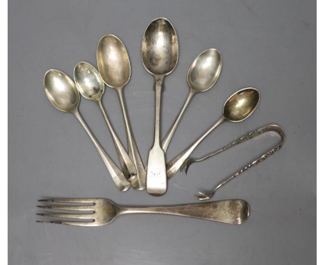 Six assorted silver teaspoons, a silver dessert fork and a pair of silver sugar tongs, 174 grams.