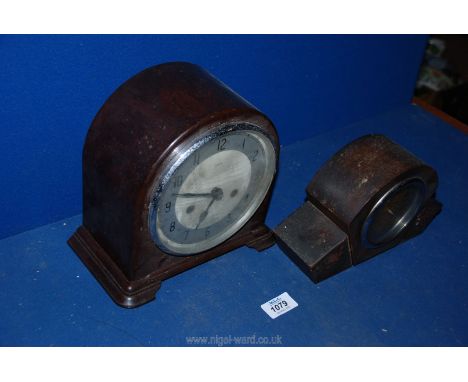 A Bakelite mantle clock by Enfield with key, plus an Art Deco style wooden mantle clock.