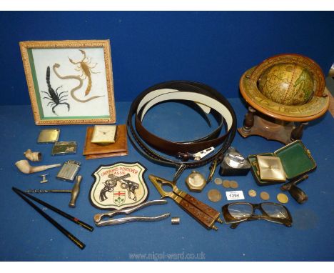 A small quantity of various Ronson and Ribbon lighters, pieces of clay pipe, hall marked silver tip (possibly the end of a pi