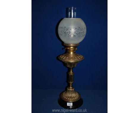A Victorian brass oil lamp on pillar type column with etched glass shade and chimney, double burner, 27 1/2".