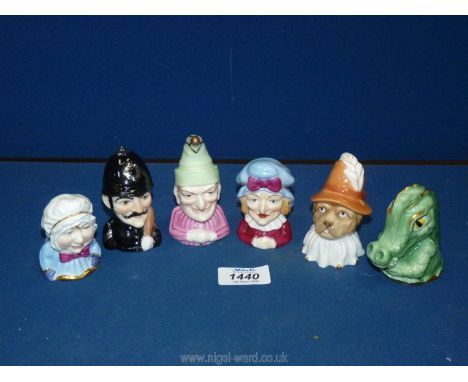 Six Royal Worcester Punch and Judy candle snuffers from The Connoisseur Collection including Punch &amp; Judy, Crocodile, Dog