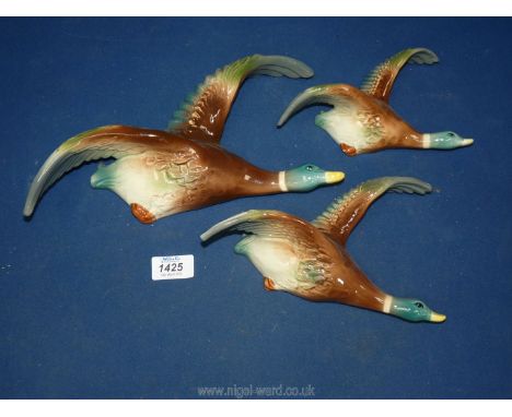 A set of three ceramic wall ducks marked H.O England.