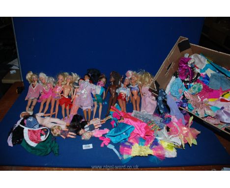 Seven Mattel Barbie dolls and four Barbie babies including Disney Ariel and Pocahontas, two Hasbro Barbie style dolls and two