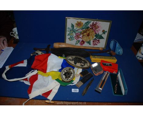 A modern framed tapestry, horse hair fly whisk, cut throat razor, bunting flags, bead work, pen etc.