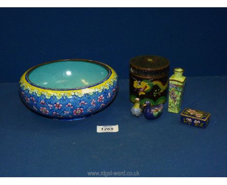 A floral enamel bowl and a small enamel vase decorated with an abstract landscape together with a cloisonne lidded pot featur