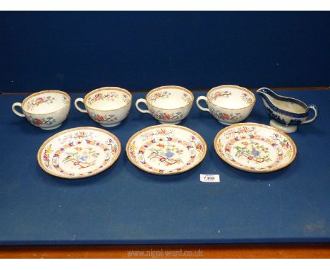 Miscellaneous 19th c. breakfast cups and saucers and a blue and white sauce boat.