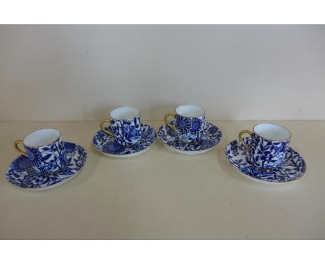 A set of four Victorian blue and white coffee cans and saucers, with kite mark, all good condition, some gilt wear 