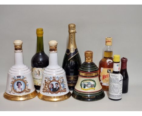 Three 75cl Bell's whisky commemorative Wade decanters; together with a 70cl White Horse blended whisky; a 75cl bottle of spar