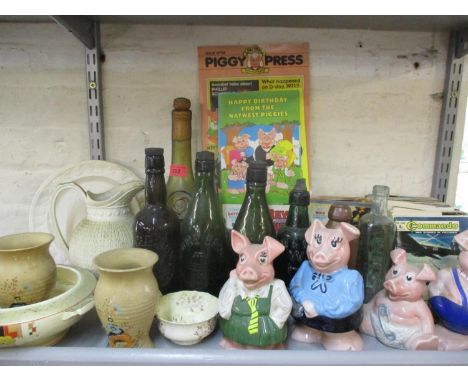 A mixed lot comprising Retro Commando and other comics, vintage glass and terracotta bottles, ceramics, vintage glass and ter