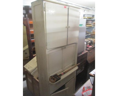 A white painted kitchen unit, together with a Singer sewing machine, shooting stick and a painted petrol can 