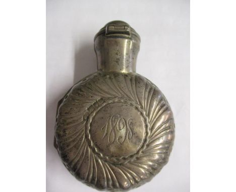 A Victorian silver scent bottle case housing a glass scent bottle 