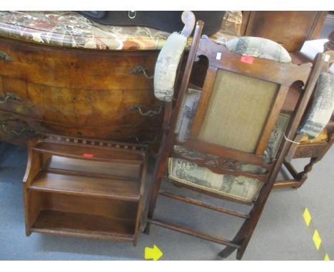 An early 20th century mahogany folding chair, together with a wall hanging shelf 