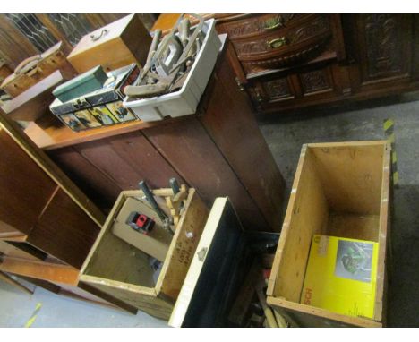 Two wooden tea chests and a painted tin trunk containing a selection of vintage tools to include a boxed Bosch circular saw, 
