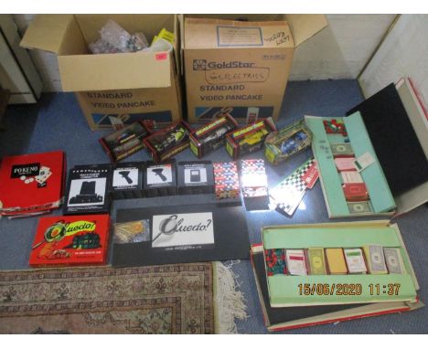 A large quantity of retro Scalextric to include box hand throttles and five boxed cars, together with a quantity of board gam