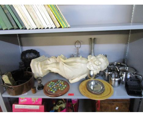 An early 20th century plaster figurine of a young girl, a silver plated four bottle cruet set, a silver trophy cup, Solitaire