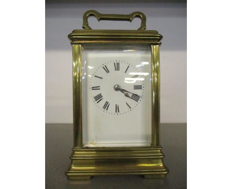 A mid 20th century French brass five window carriage clock with key 