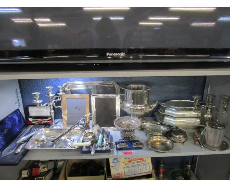 A selection of silver and silver plate to include two silver wine labels, photograph frames, a pair of candelabras and other 