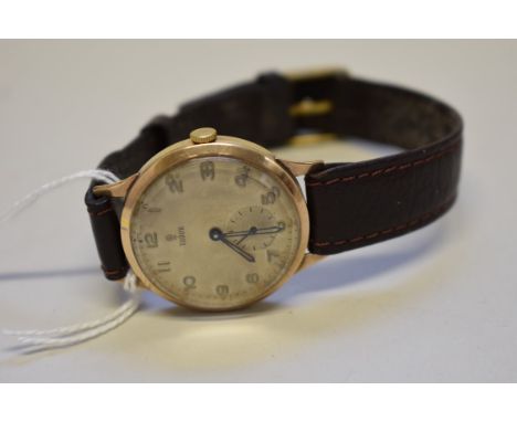 A 1950s Tudor 9ct gold gentlemans manual wristwatch,&nbsp;Edinburgh 1957, on leather strap. 32mm. Rear of case engraved 'B R 