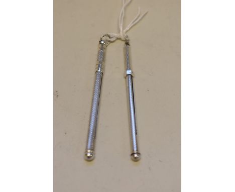 Two sterling silver engine turned cocktail swizzle sticks,&nbsp;10g. 
