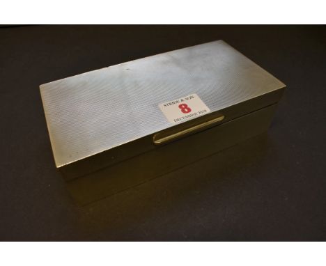 A silver rectangular engine turned cigarette box, by C J Vander,&nbsp;London 1963, 18cm x 9cm, 540g all in. 